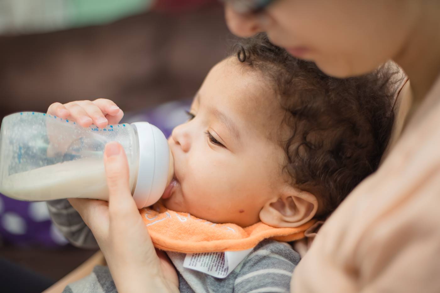 Toddler Drinking Milk Bottle