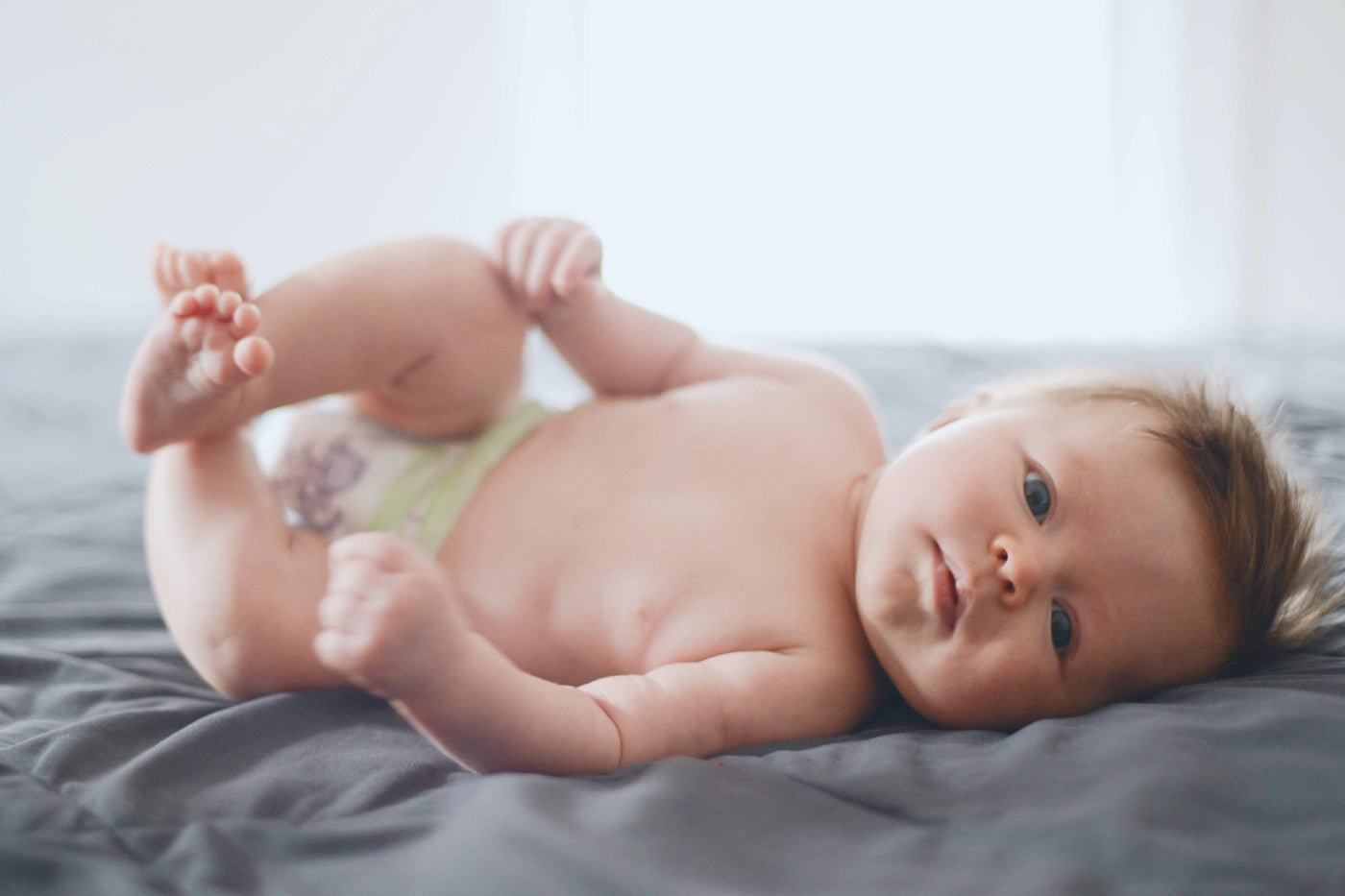 When Can Baby Roll Over? Tips to Help Baby Roll 